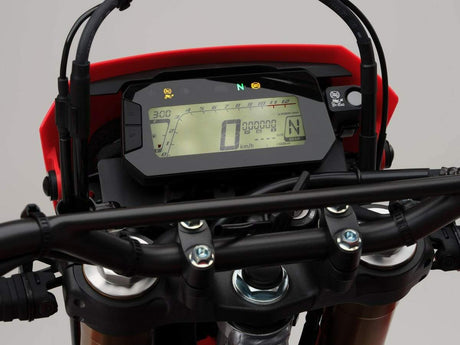 Honda CRF300L 2025 Swift Grey dashboard and cockpit digital display and controls on rental motorcycle in Bosnia